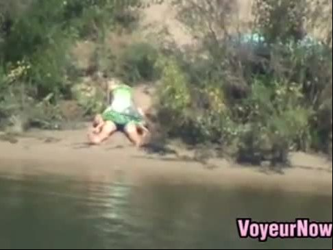 Horny couple by the river